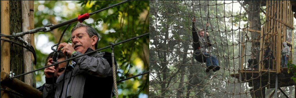 Dr Andy Ninham enjoying some downtime on a Go Ape course at the Hawkins AGM.