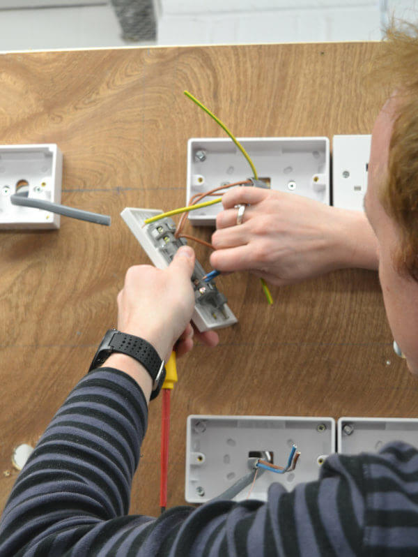 Hawkins investigator carrying out electrical training