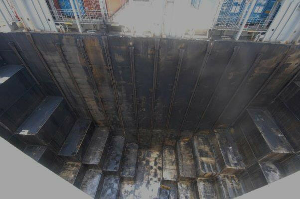Inside a hold on a container ship