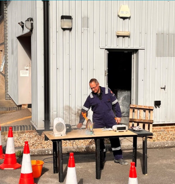 Fire Expert Nick Carey displays how an electrical appliance can catch fire